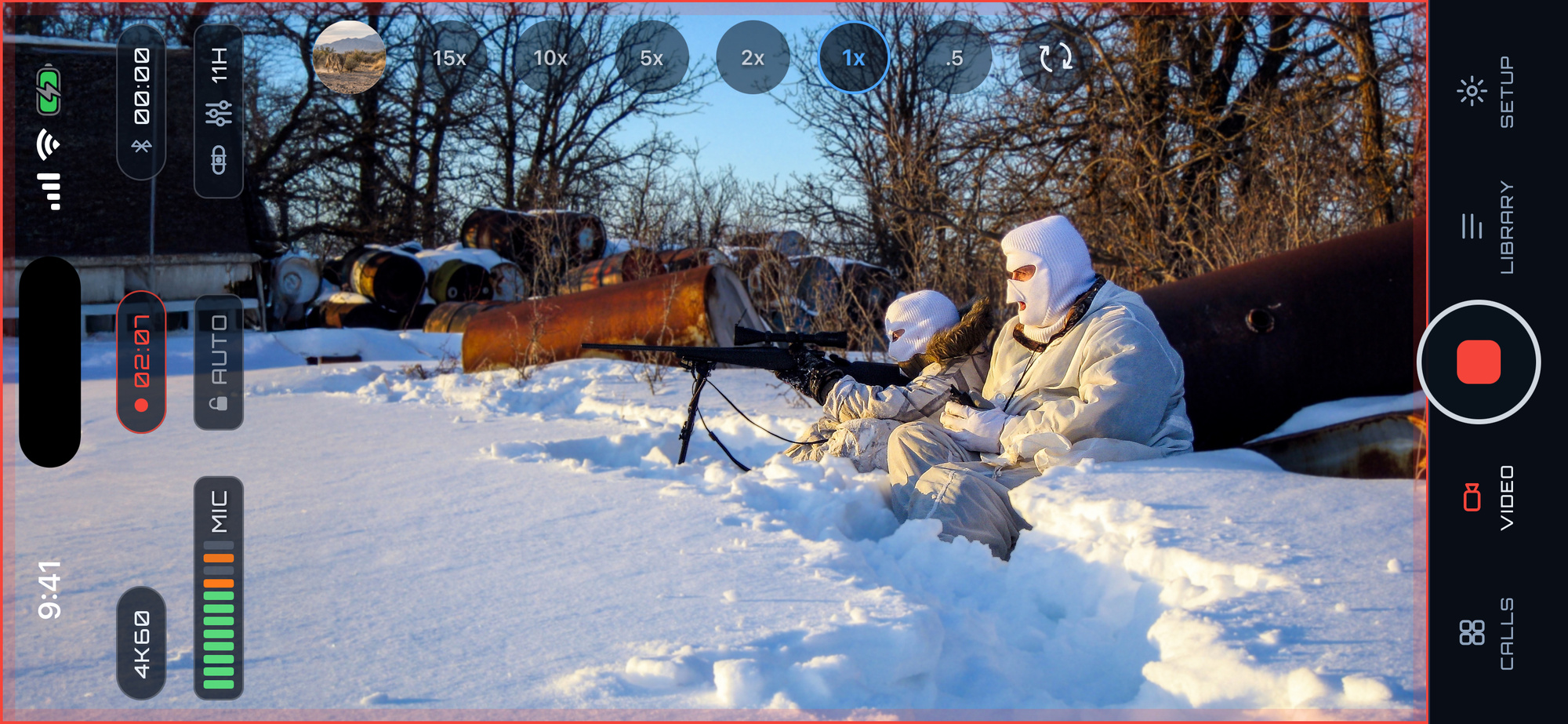 Pro Video filming two predator hunters in the snow with the call buttons off